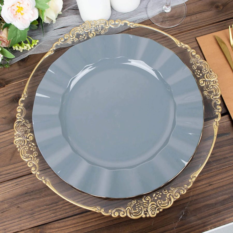 Mint green plastic dinner plate with a thin gold rim. Disposable tableware for wedding or party favors.