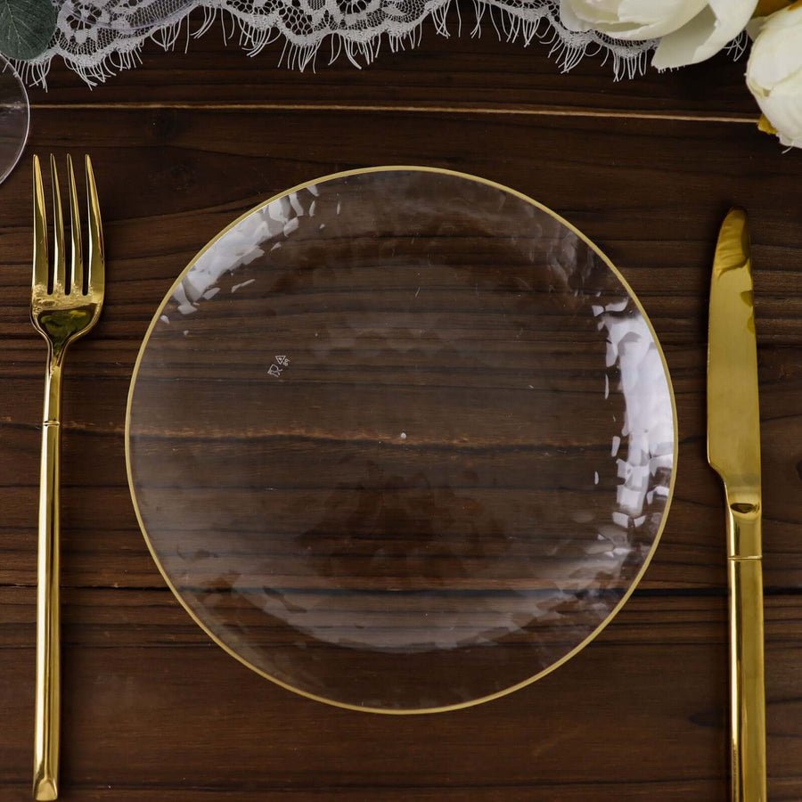 Ivory hammered plastic dinner plate with gold rim. High-quality disposable tableware for weddings & events.