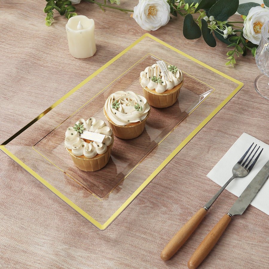 Cupcakes served on clear rectangular plastic serving tray with gold rim for elegant event table