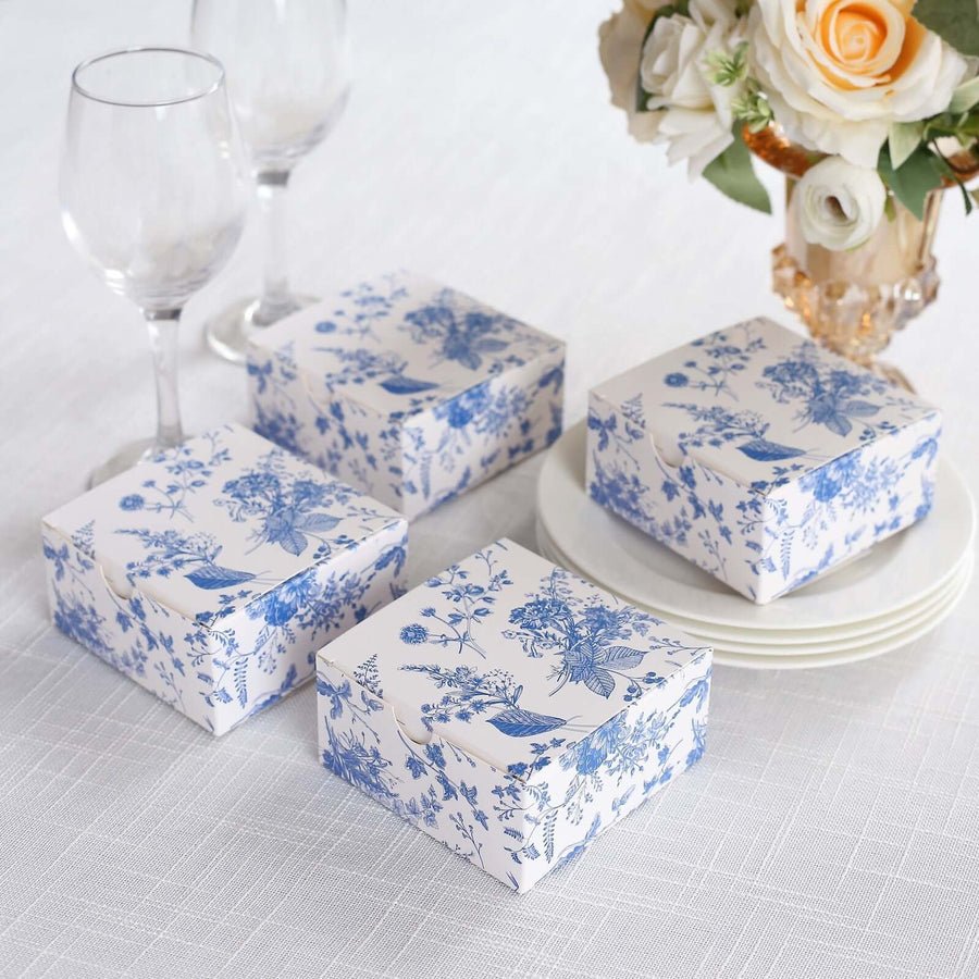 Set of blue floral favor boxes with vintage design. Perfect wedding or party gift packaging.