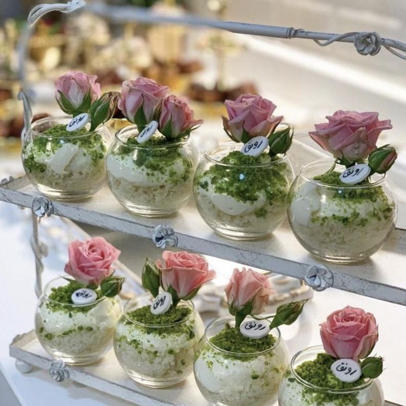 Acrylic sphere dessert cups with rose floral decorations