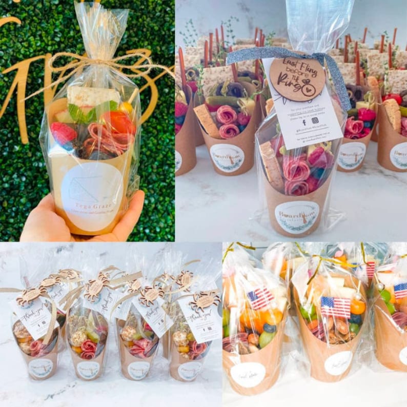 Brown kraft charcuterie favor cup with personalized label and clear favor bag.