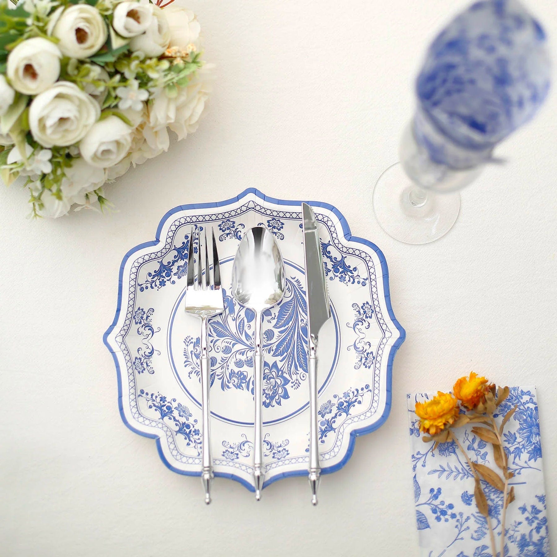 Blue and white chinoiserie scallop rim disposable plate with cutlery