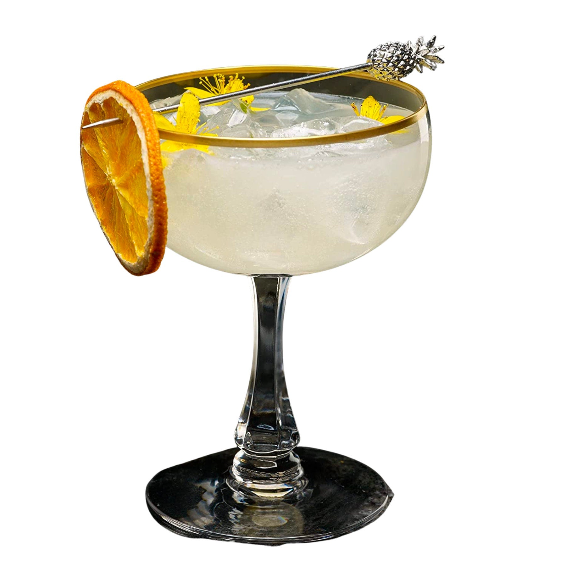 Coupe cocktail with citrus wheel and silver pineapple stir stick