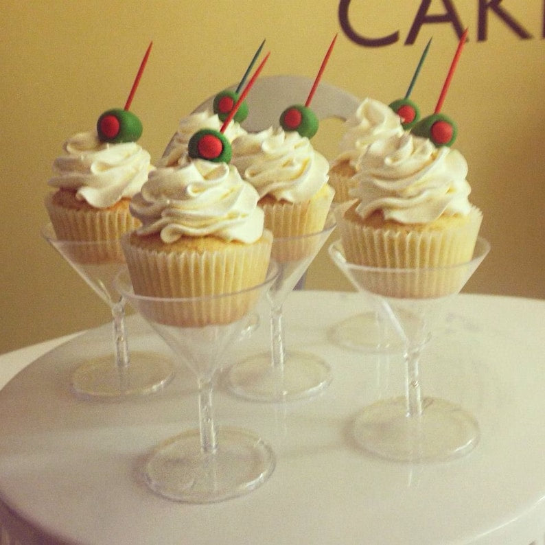 Clear acrylic martini cups used to serve cupcakes for dessert display