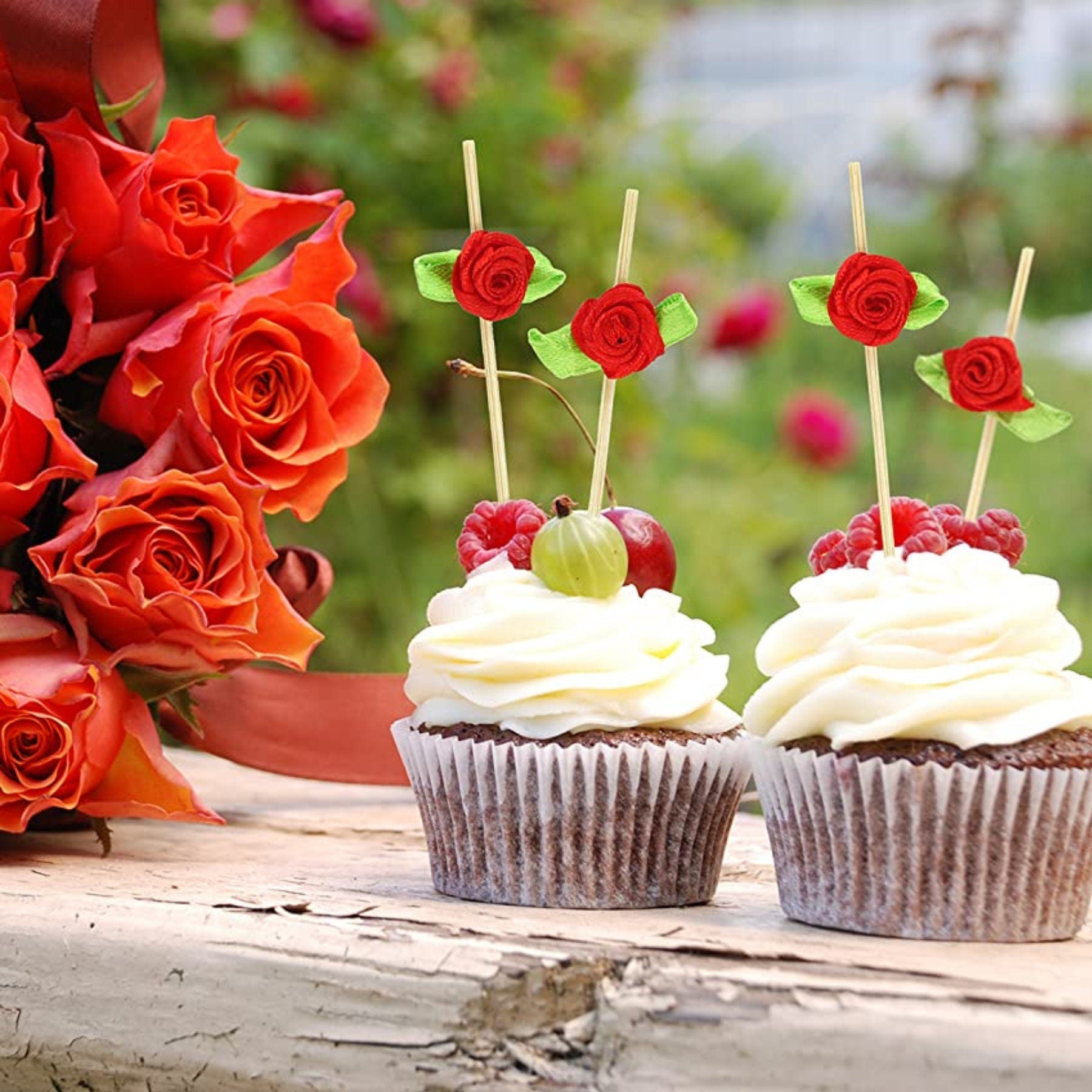 Cupcakes decorated with rose floral appetizer picks
