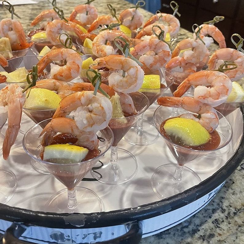 Close-up of durable, recyclable plastic shrimp cocktail glasses, emphasizing their beauty and convenience.