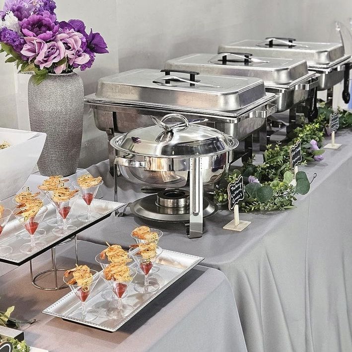 Martini-style shrimp cocktail glasses with appetizers arranged beautifully, perfect for weddings and formal gatherings.