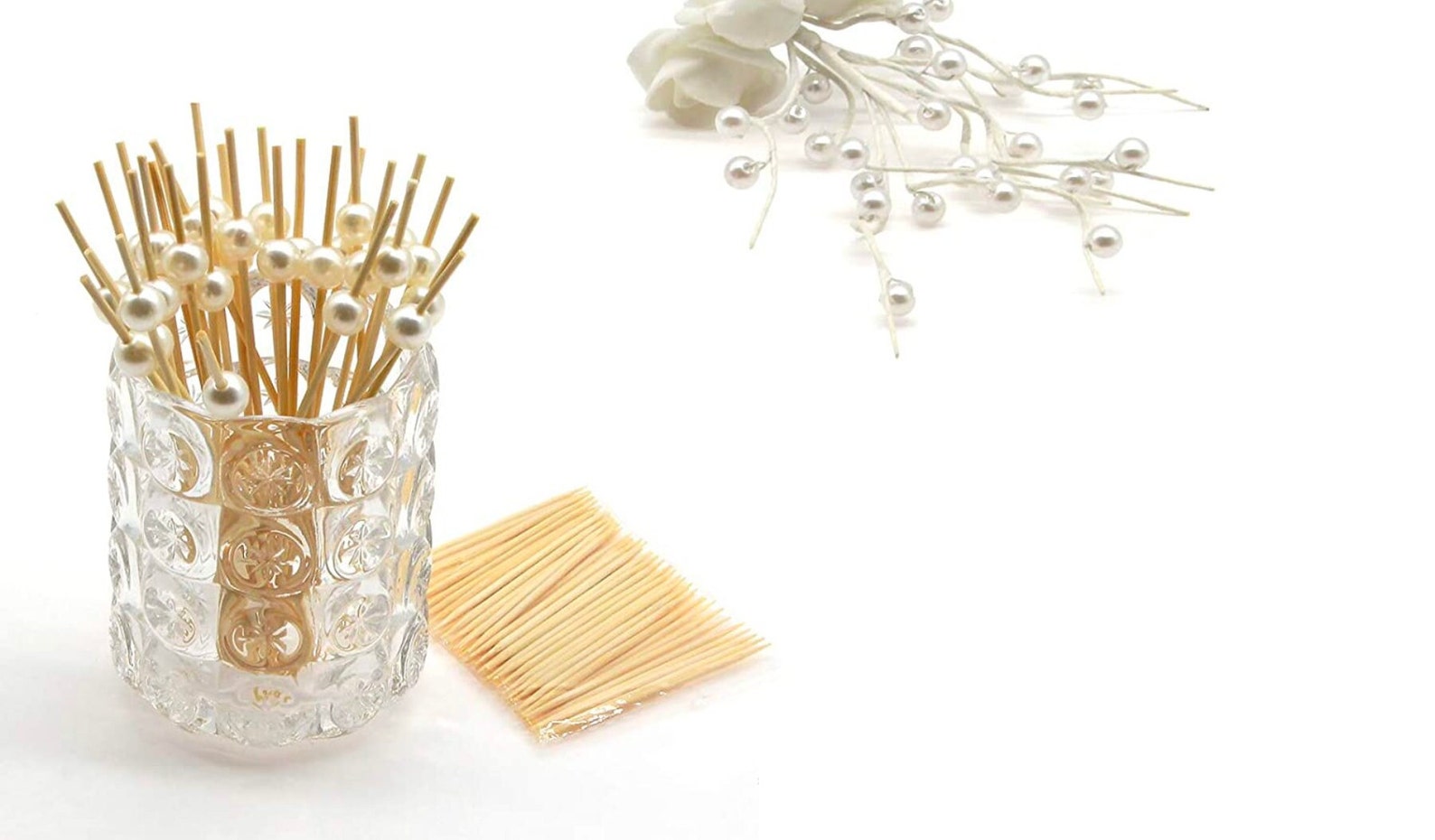 Elegant pearl bamboo toothpicks arranged for serving appetizers