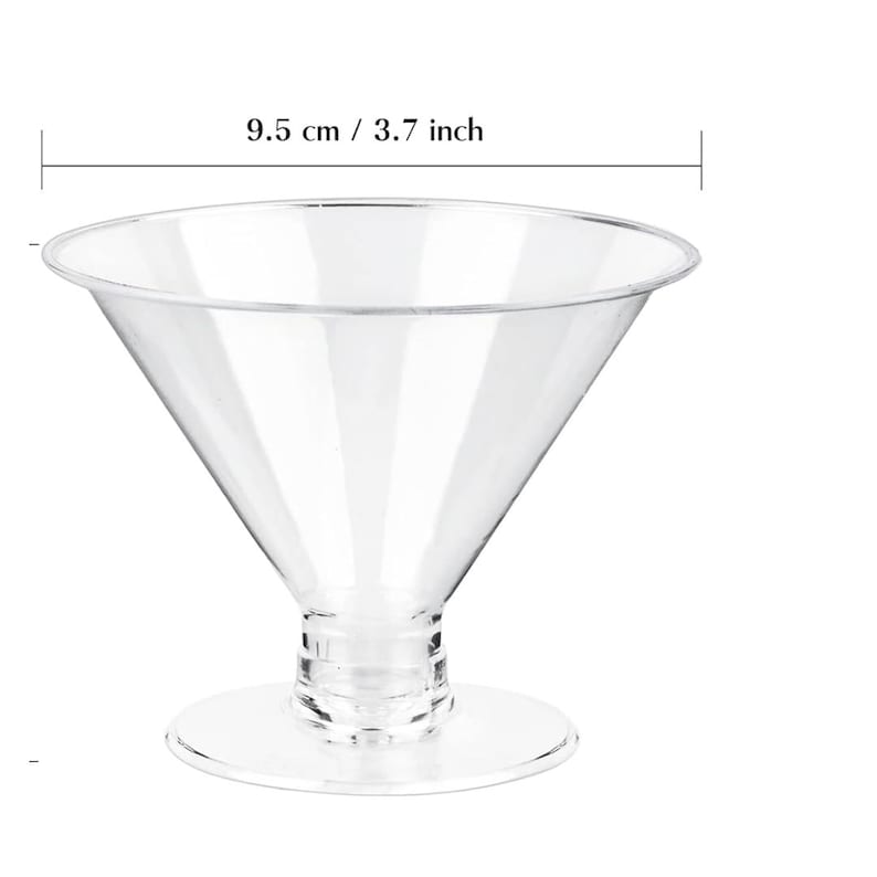 Elegant event setup featuring individual salad cups for party, filled with snacks and salads, perfect for catering displays.