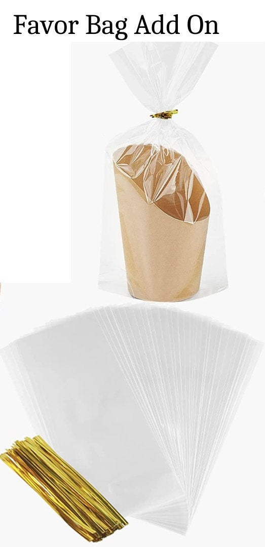 Favor bag add-on option showing white charcuterie cup wrapped in clear gift bag with elegant gold tie for events and parties.