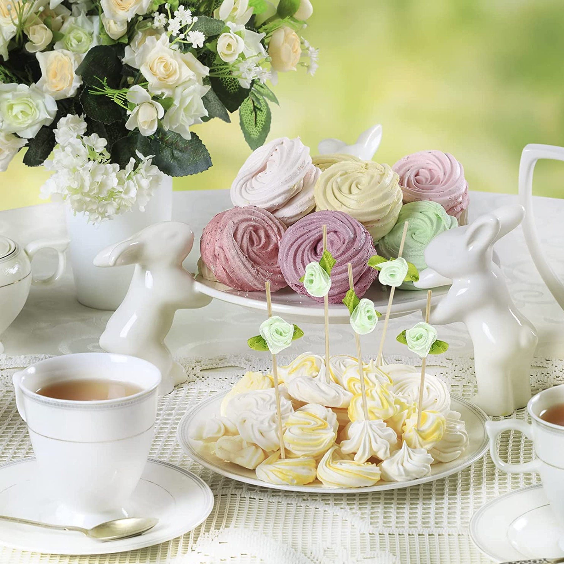 Afternoon tea desserts decorated with rose charcuterie toothpicks