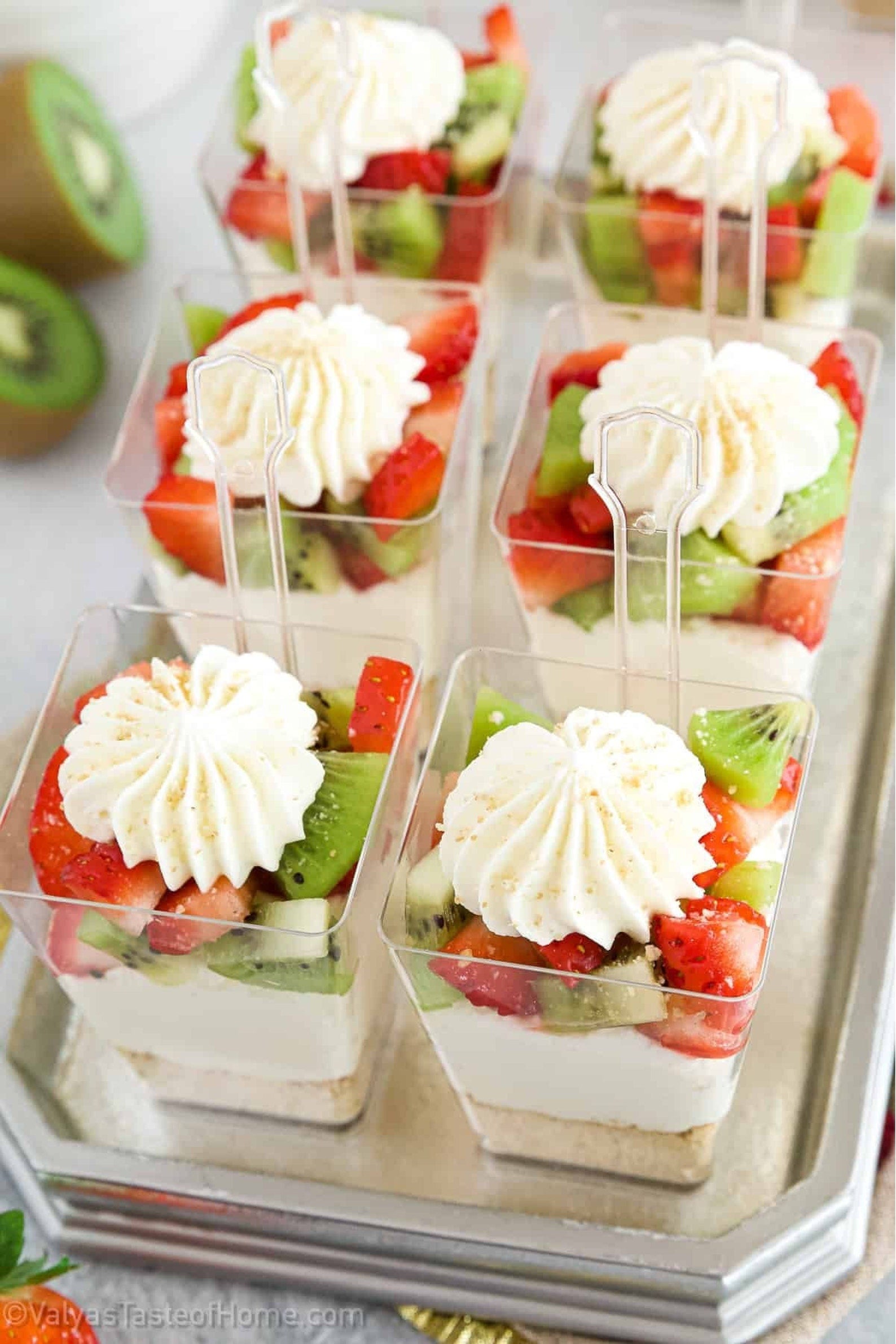 Fruit dessert in clear plastic parfait cup with mini spoon