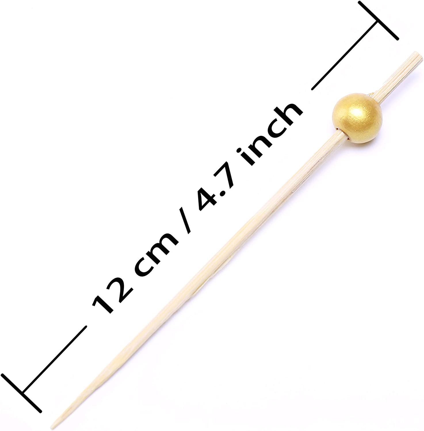 Measurement of gold fancy toothpick showing 4.7 inches length, perfect size for charcuterie cups and appetizer servings.