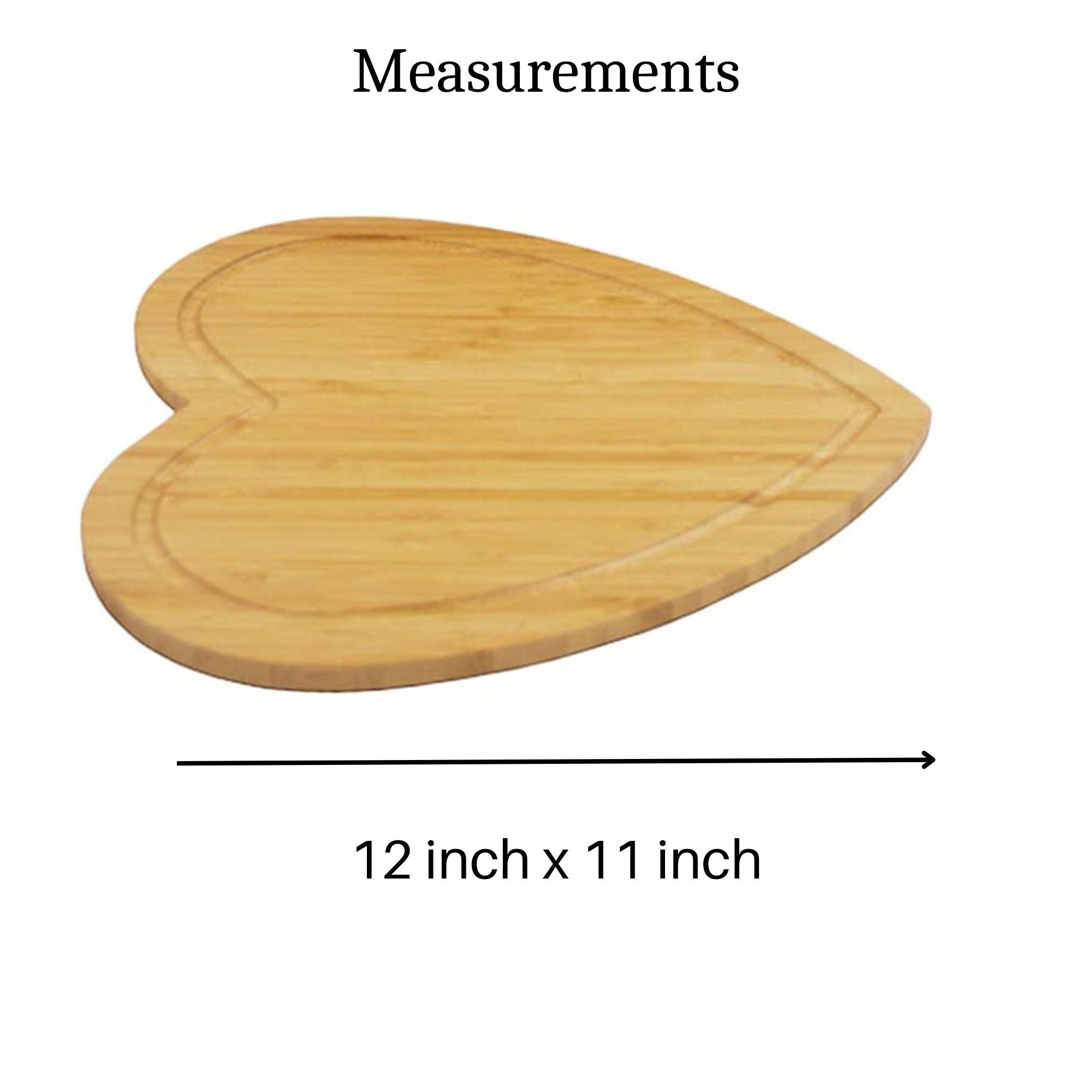 Heart-shaped bamboo charcuterie board measuring 12 inch by 11 inch