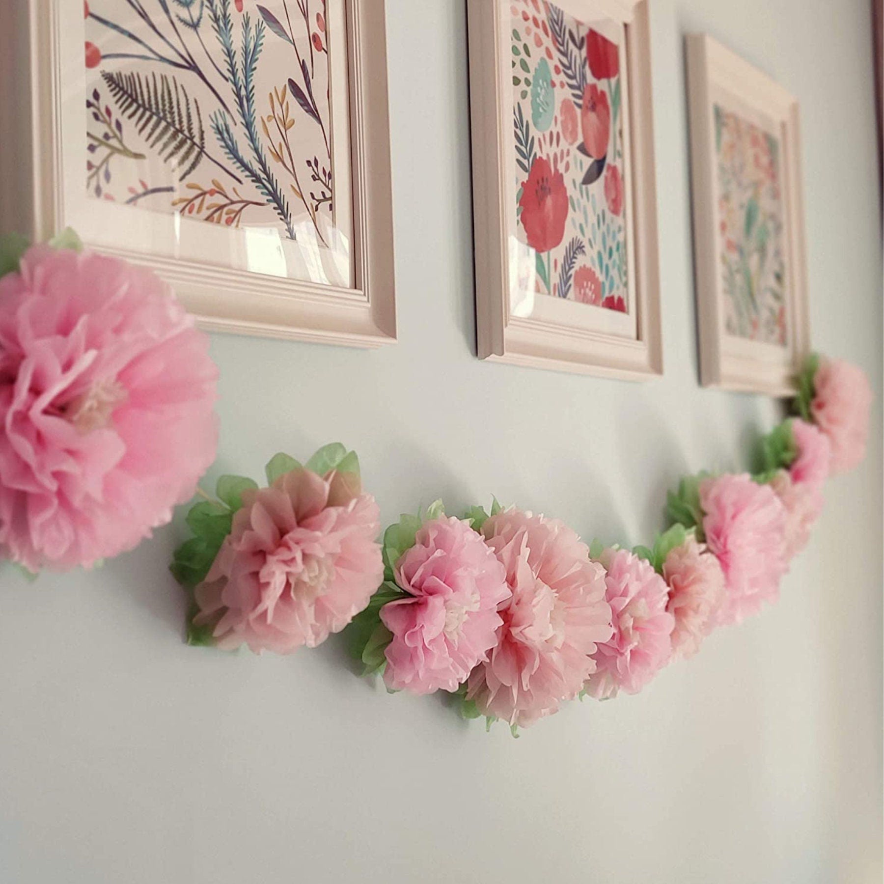 Huge paper flowers as nursery wall decor for girls' bedroom