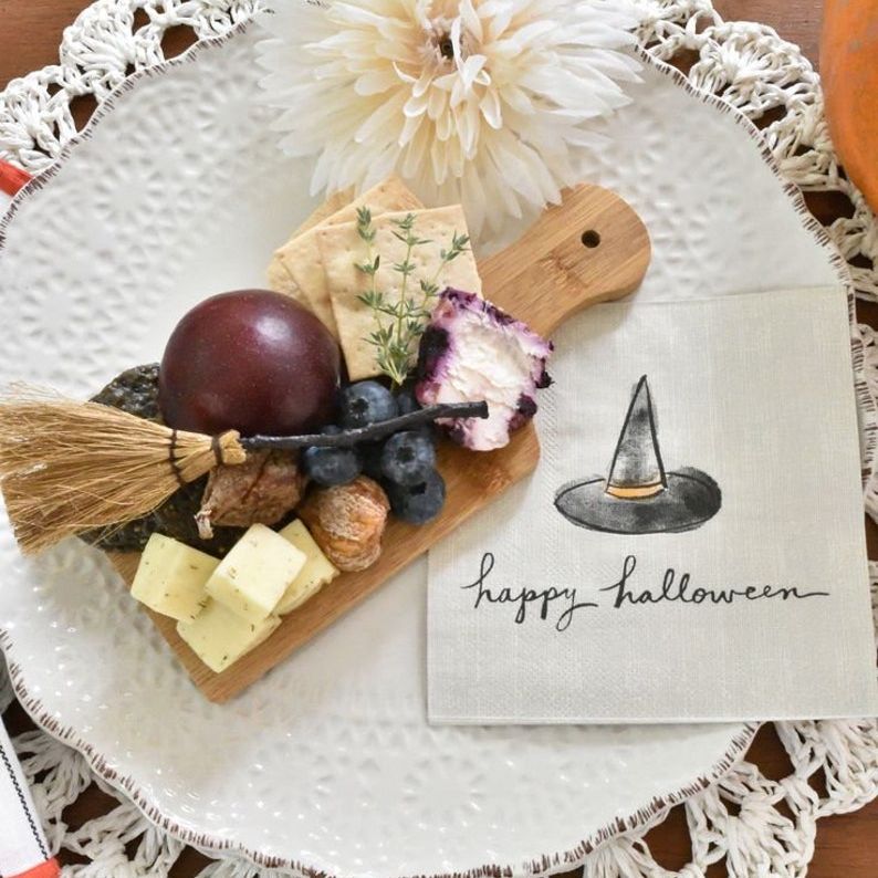 Seasonal appetizer display on mini wooden board with cheese and chocolate