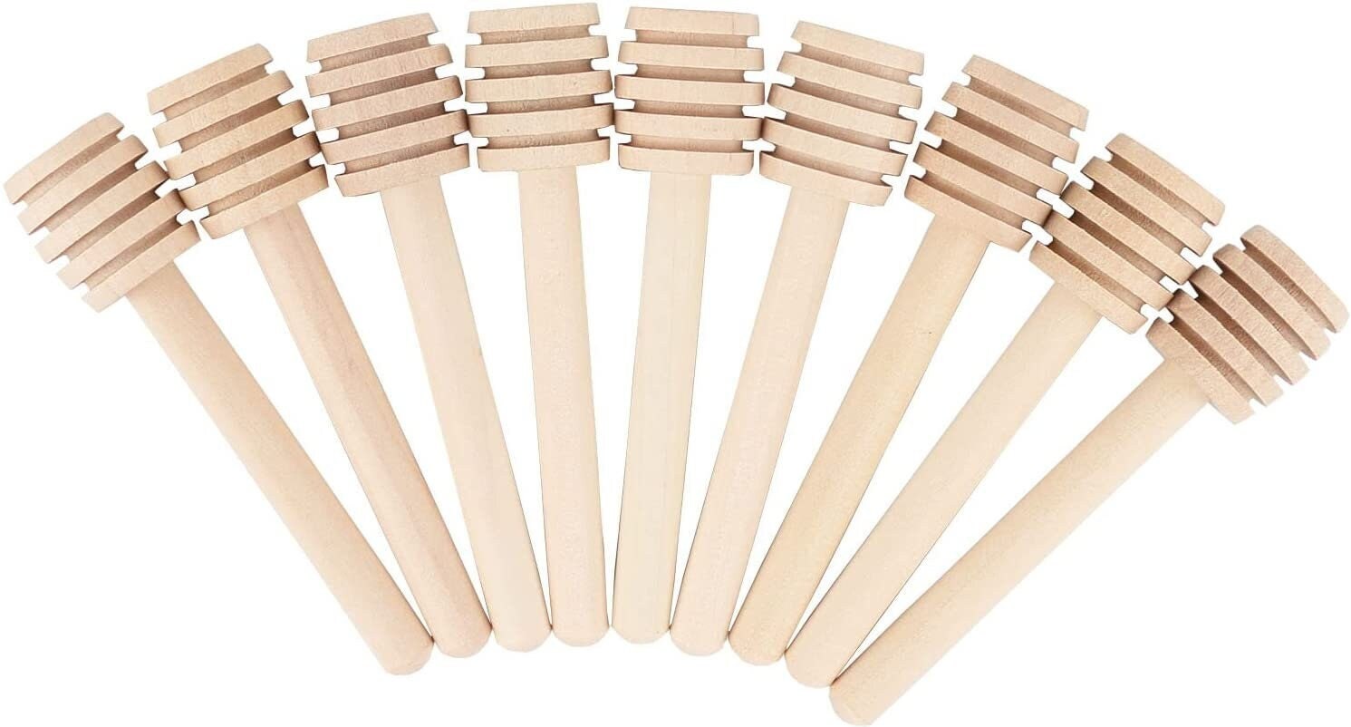 Set of mini wooden honey dipper sticks arranged in fan shape