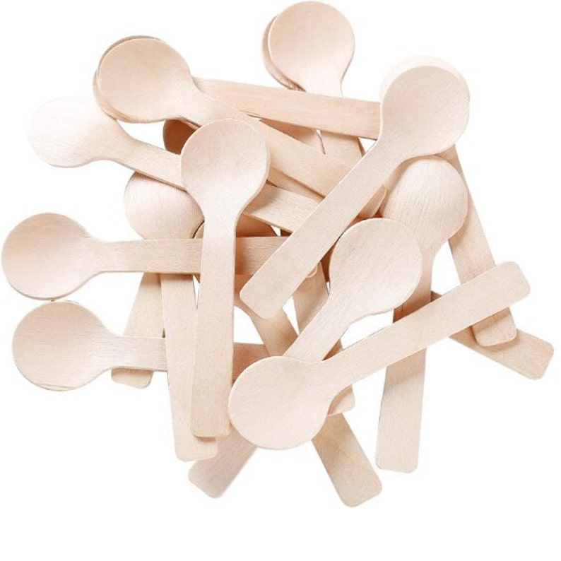 Mini wooden spoons grouped together, showcasing their rustic charm and perfect pairing with mini acrylic soup cups for elegant single-serve presentations.