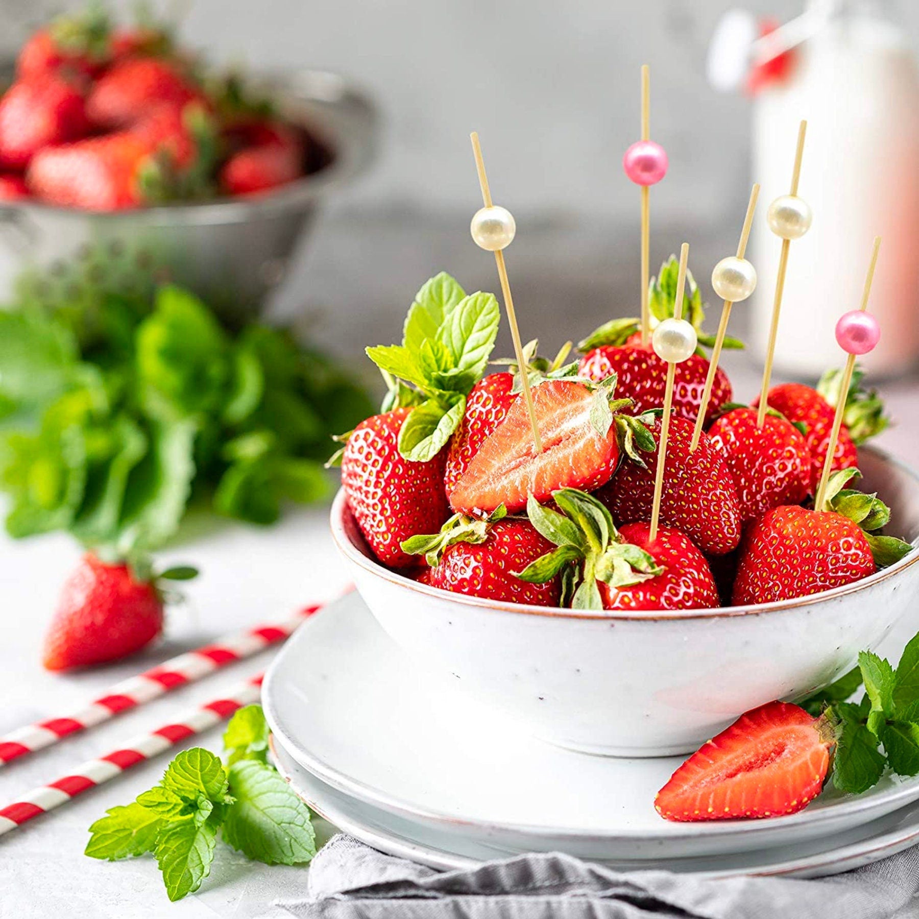 Appetizer picks with pearl tops used for strawberries and fruit serving