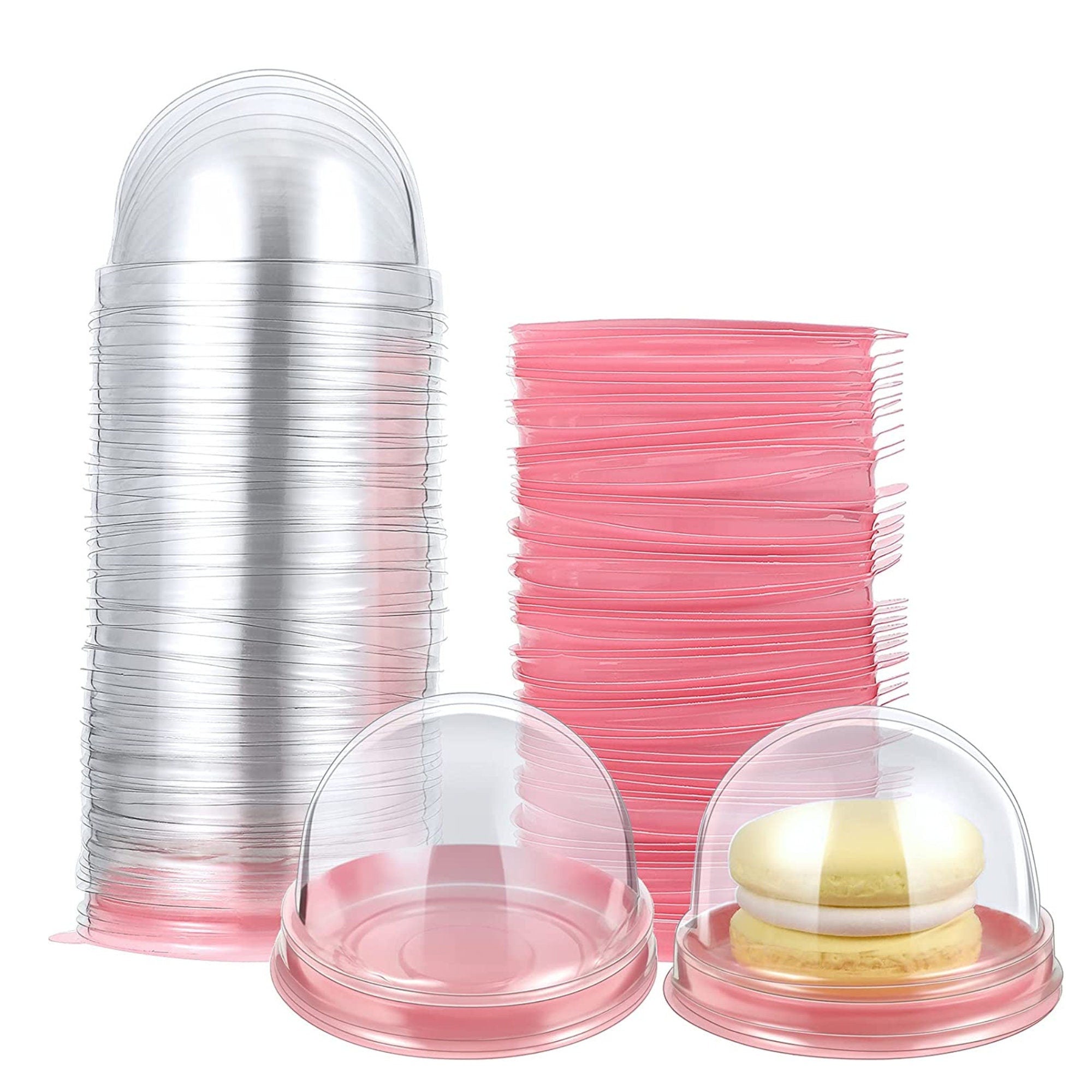 Stack of pink macaroon box bases with clear dome covers, perfect for parties and events.