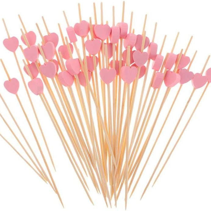 Set of pink heart-shaped fancy bamboo toothpicks for charcuterie and appetizers