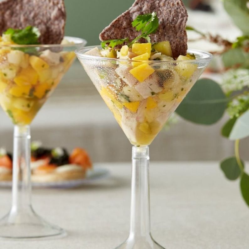 Acrylic martini-style cups used for savory appetizers and event catering displays