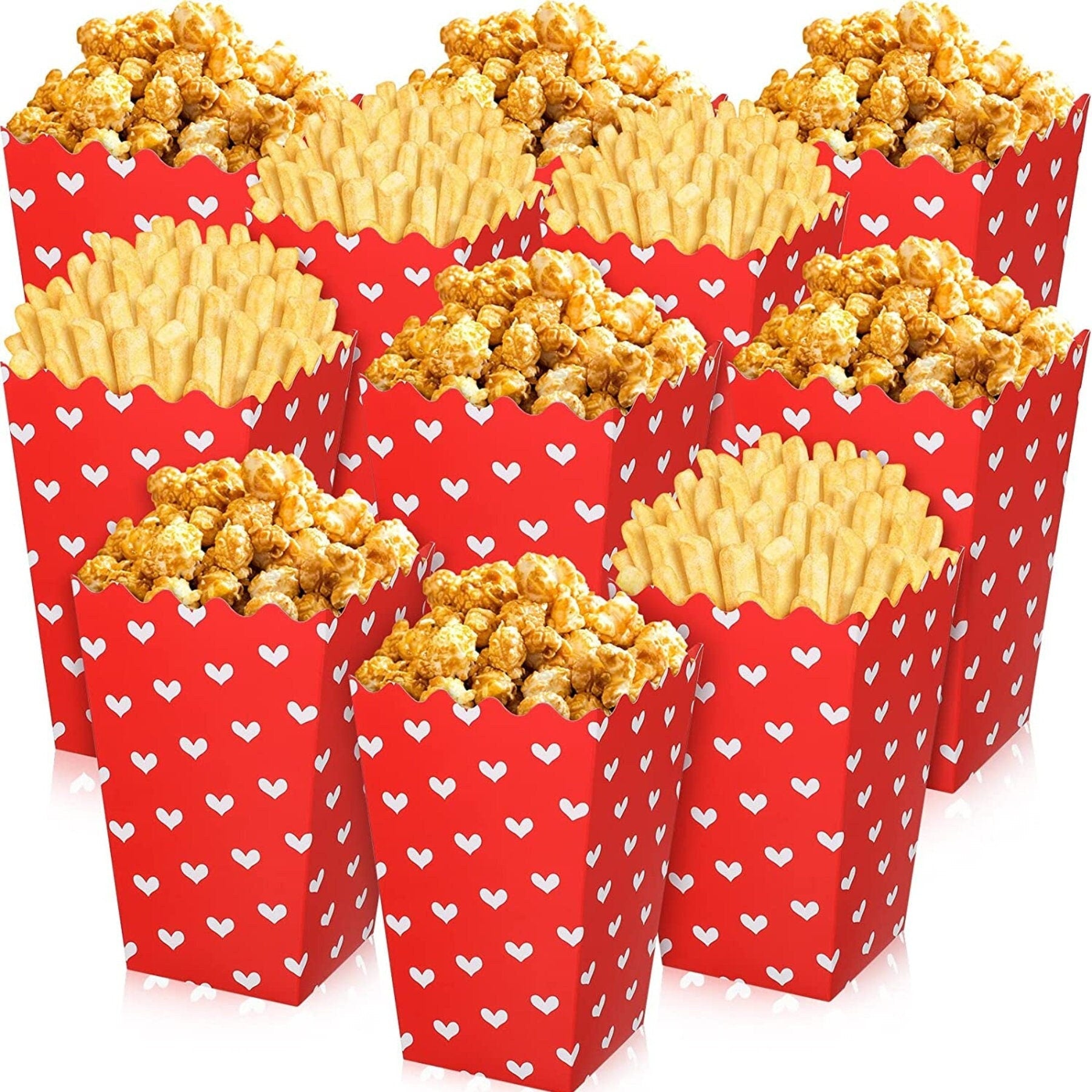 Red heart print popcorn cups filled with caramel popcorn and golden fries for party snacking and celebrations.