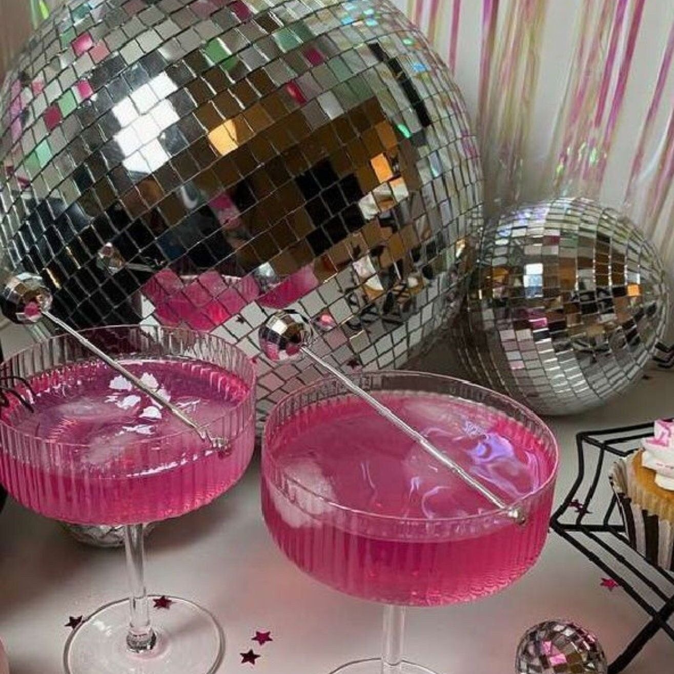 Hanging 12-inch silver mirror disco ball for baby showers or festive gatherings.