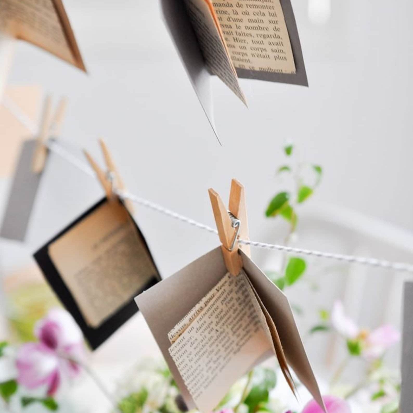Stack of authentic vintage book pages in warm, aged tones.