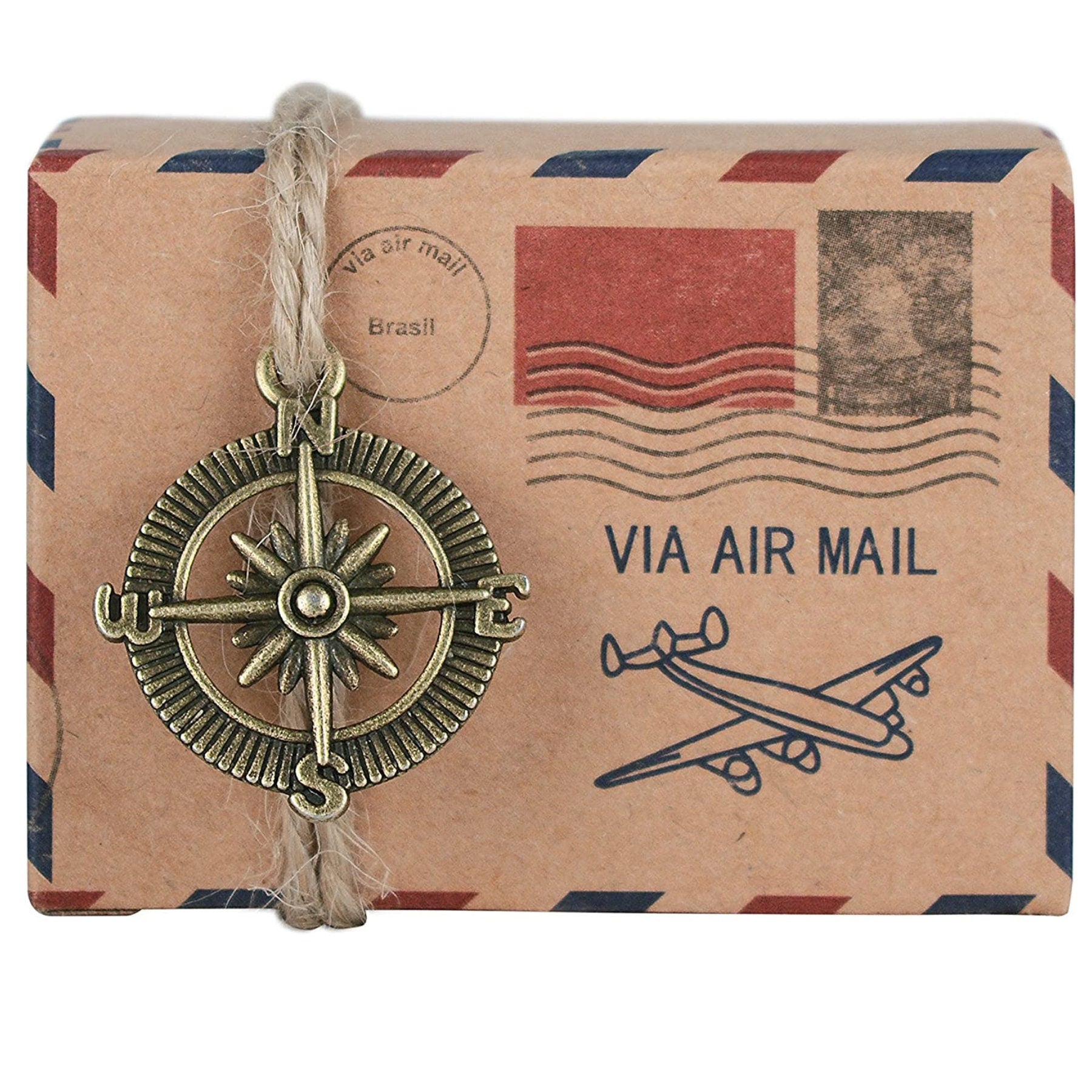 Sturdy suitcase favor box tied with twine and decorated with compass charm.