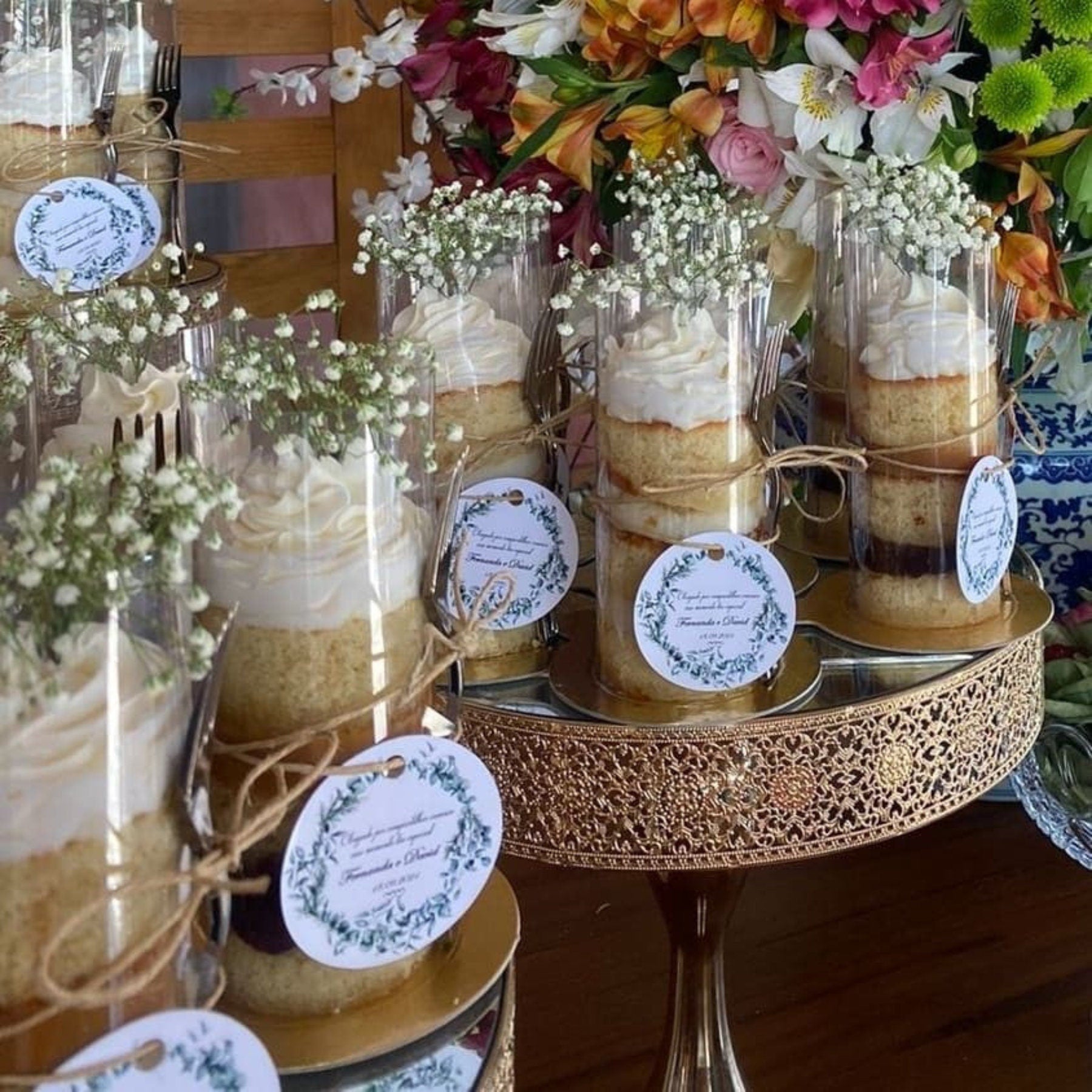 Wrapped cake on a decorated wedding dessert table, emphasizing its elegant and polished presentation.