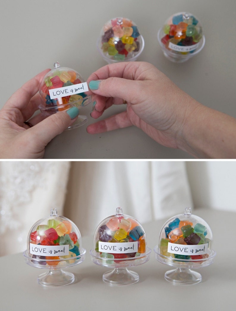 Clear mini dessert holders with dome lids for serving individual cakes, sweets and party favors