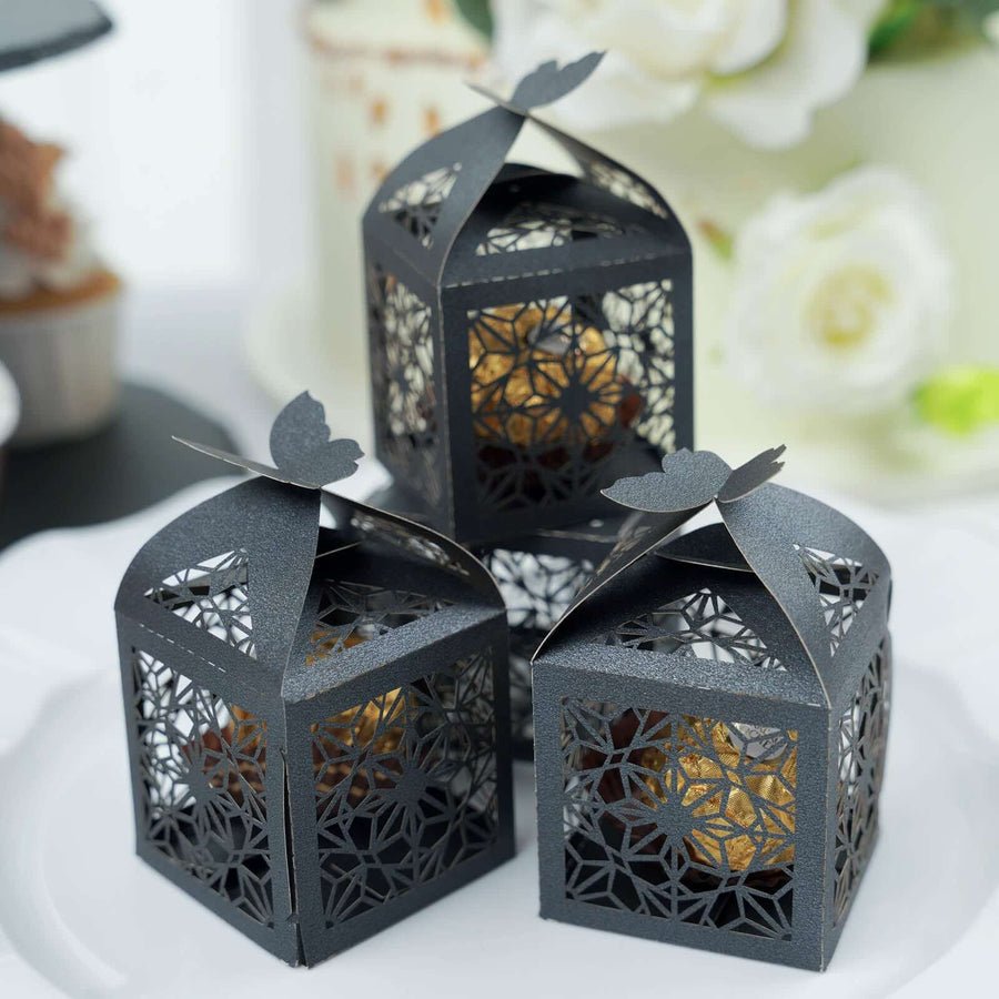 Black butterfly favor boxes with cutout floral pattern – perfect for weddings and events