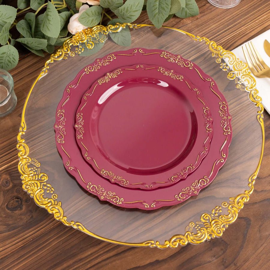 Clear plastic wine cups with gold trim rim. High-quality disposable drinkware for events.