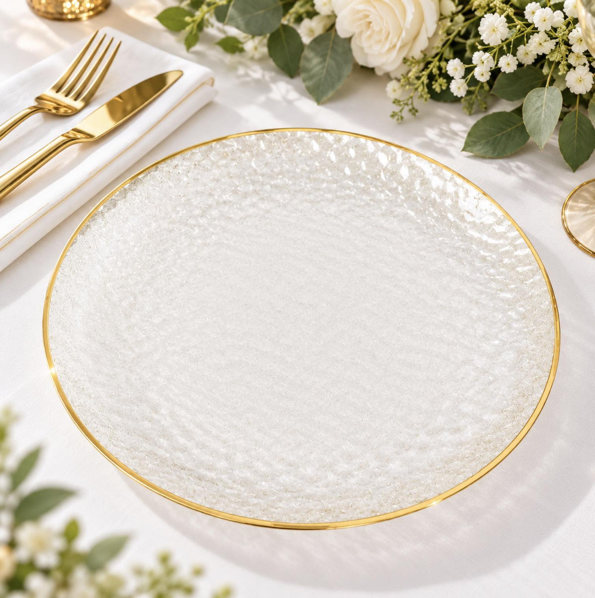 Light blue hammered plastic dinner plate with gold rim & cutlery. Disposable tableware for events.