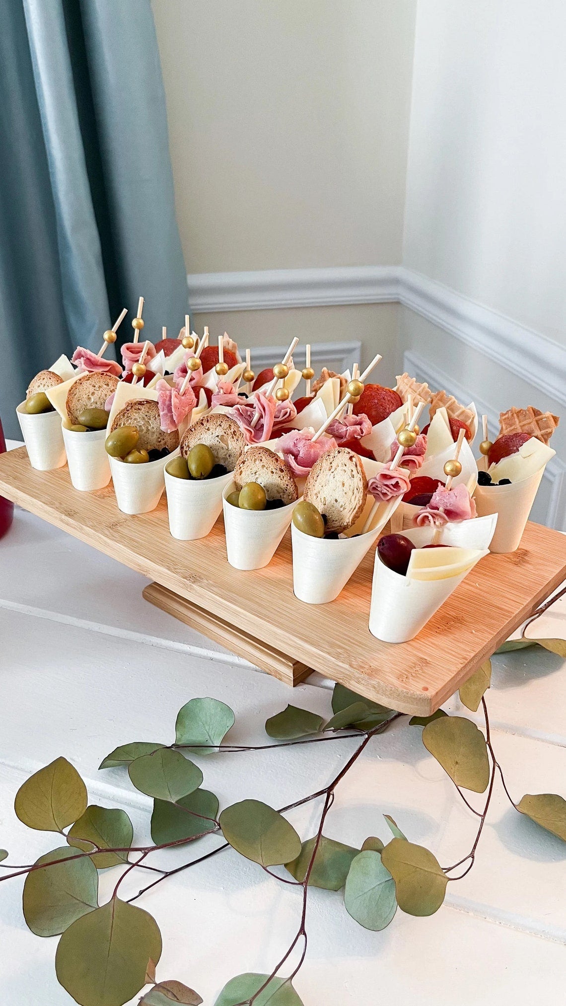 Wooden charcuterie cone and stand options (12, 20, or 36 count). Disposable appetizer cones for catering.