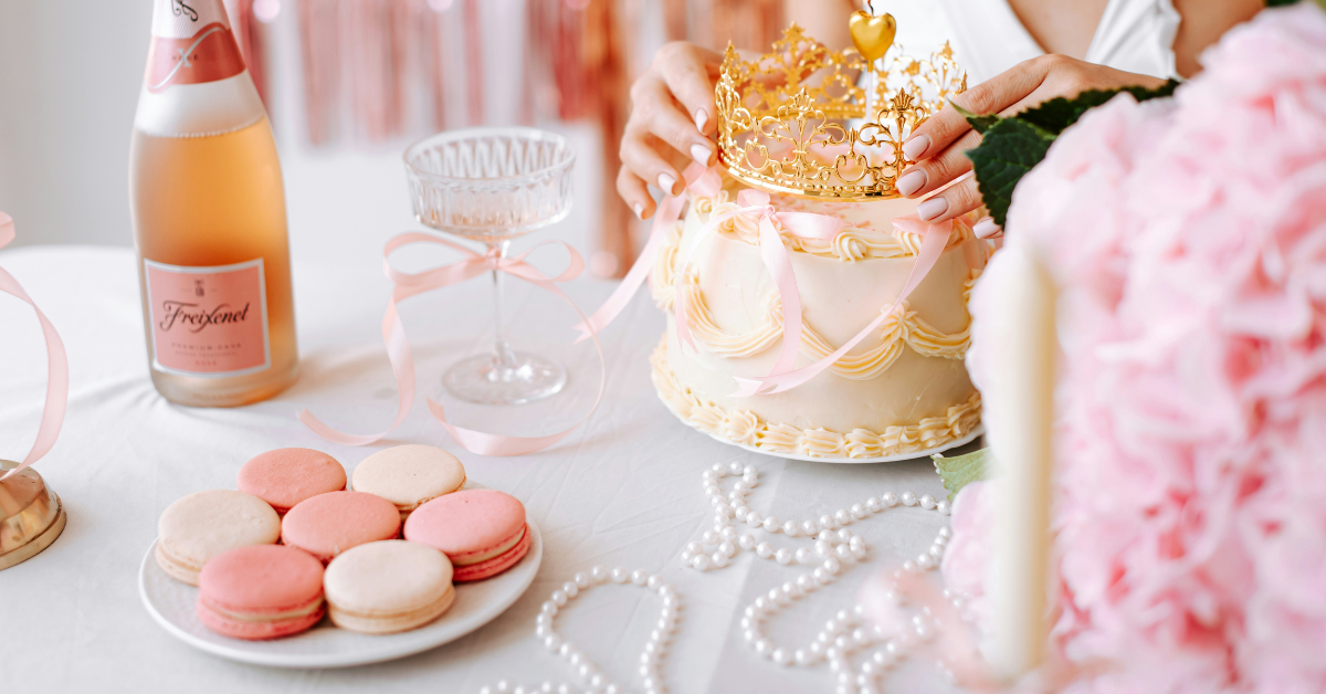 Assortment of party favors, charcuterie cups, and baby shower kits on styled event table