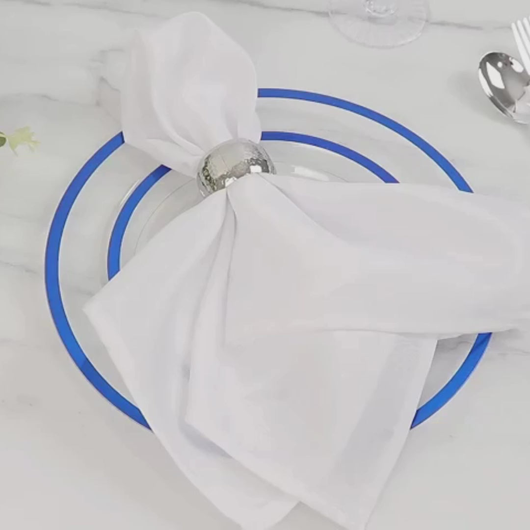 A detailed showcase of 11″ ruffled rim plastic dinner plates in use — elegant disposable plates for weddings, banquets & events.