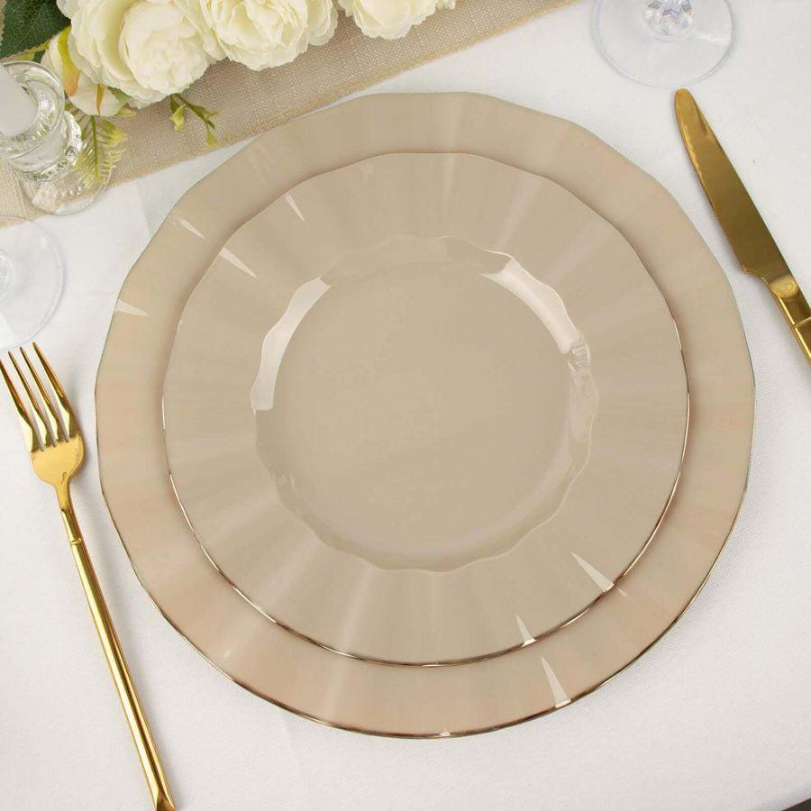 Set of mini gold plastic dessert spoons. Disposable cutlery for wedding or party dessert tables.