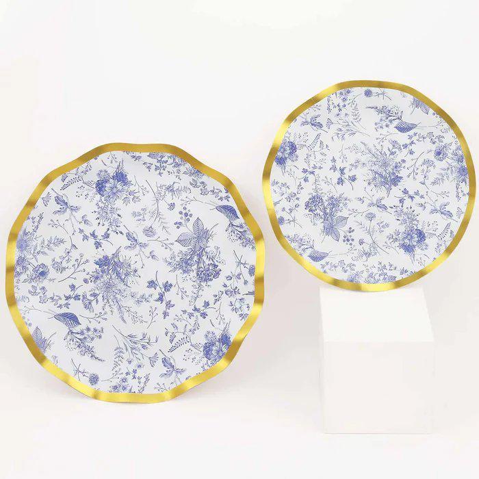 7 inch dusty rose plastic dessert plate with an elegant gold rim. Disposable tableware for cake or appetizers.