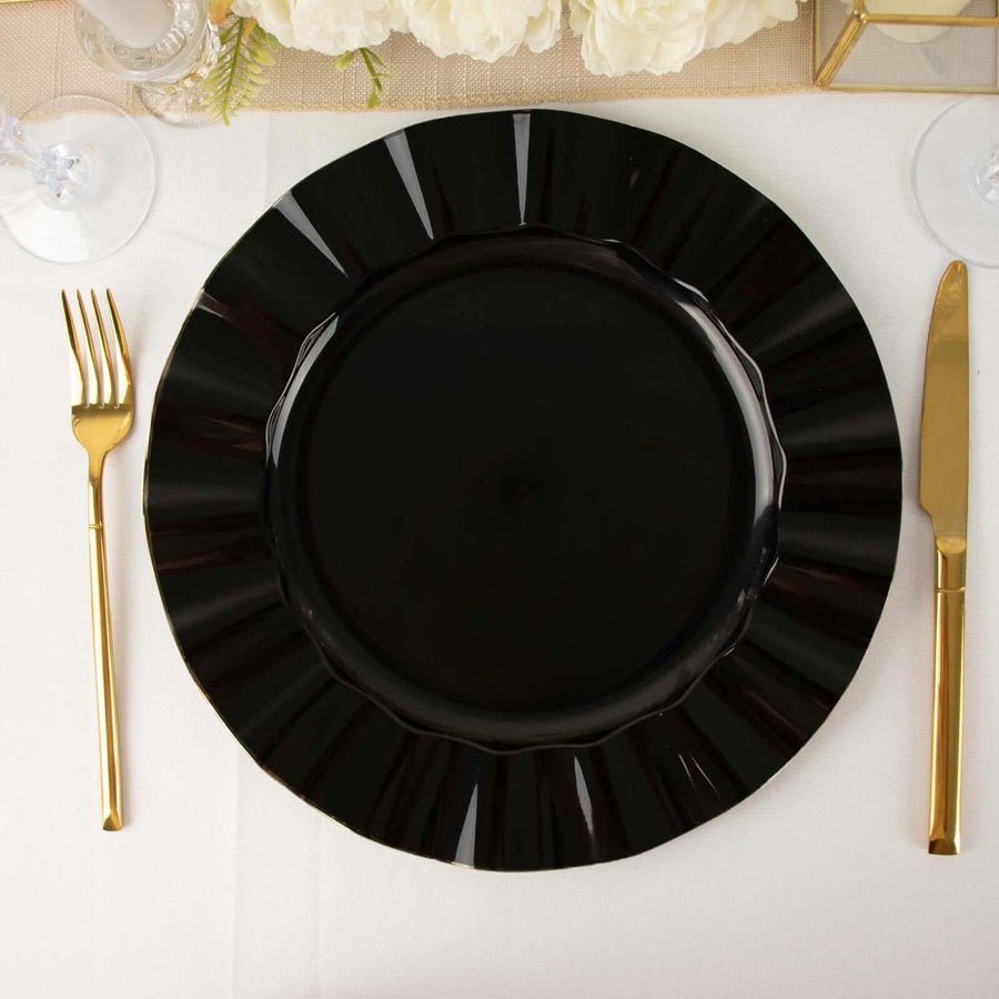 7 inch black plastic dessert plate with an elegant gold rim. Disposable tableware for appetizers.