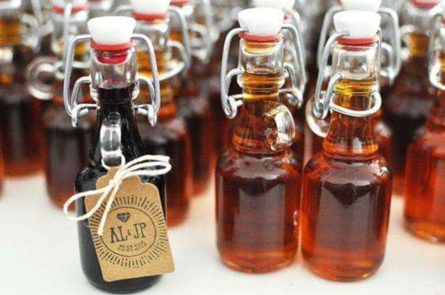 Mini Swing Top Glass Bottles with Tags and Twine for Party Favors (2 oz 15 Pack)