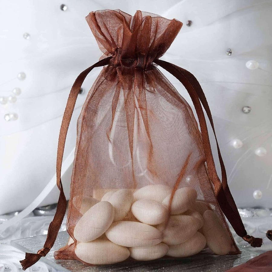 Chocolate organza drawstring gift bag filled with white almonds – elegant 4"x6" favor pouch for weddings and special events