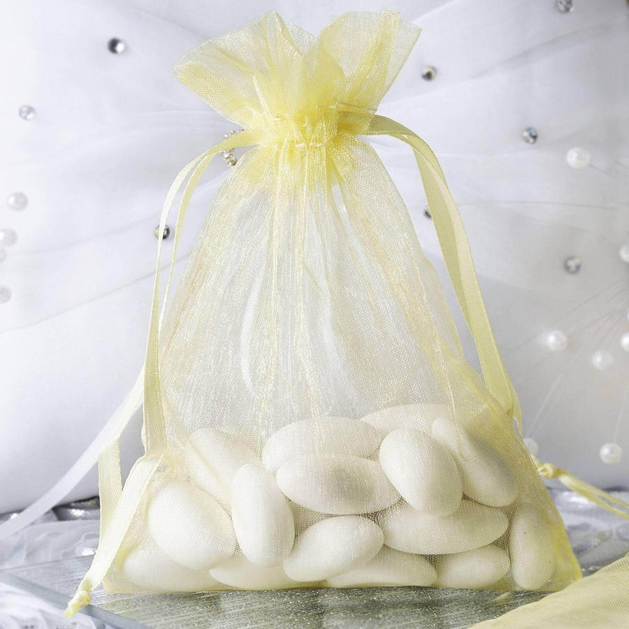 10-pack of 4x6 yellow organza drawstring bags for wedding party favors.