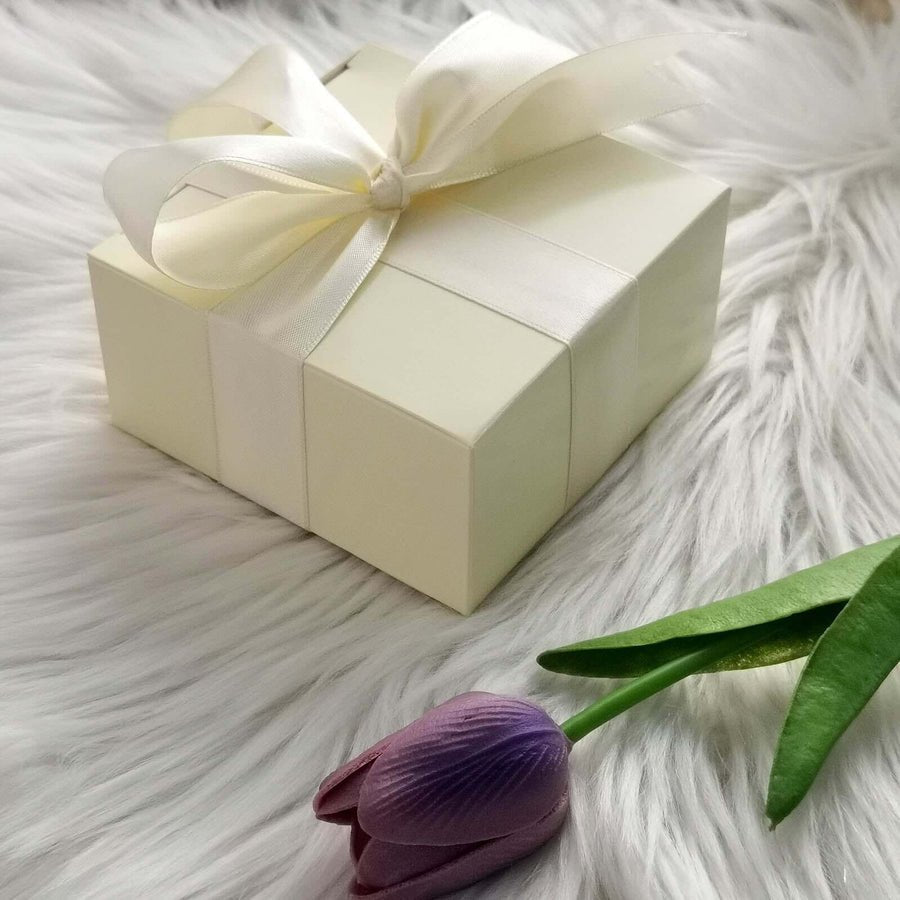 White favor box with 4x4x2 inch dimensions. Perfect size for small wedding and party favors.