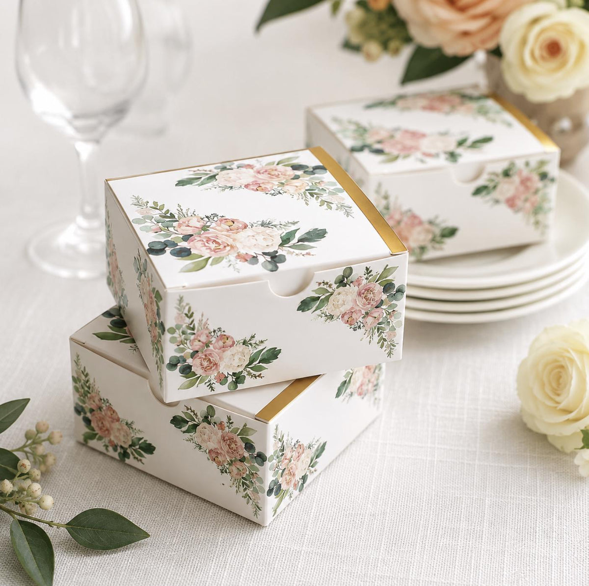 Set of blue floral favor boxes with vintage design. Perfect wedding or party gift packaging.