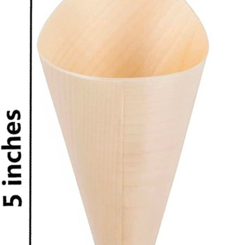 Close-up of disposable bamboo cone for appetizers, charcuterie, or desserts
