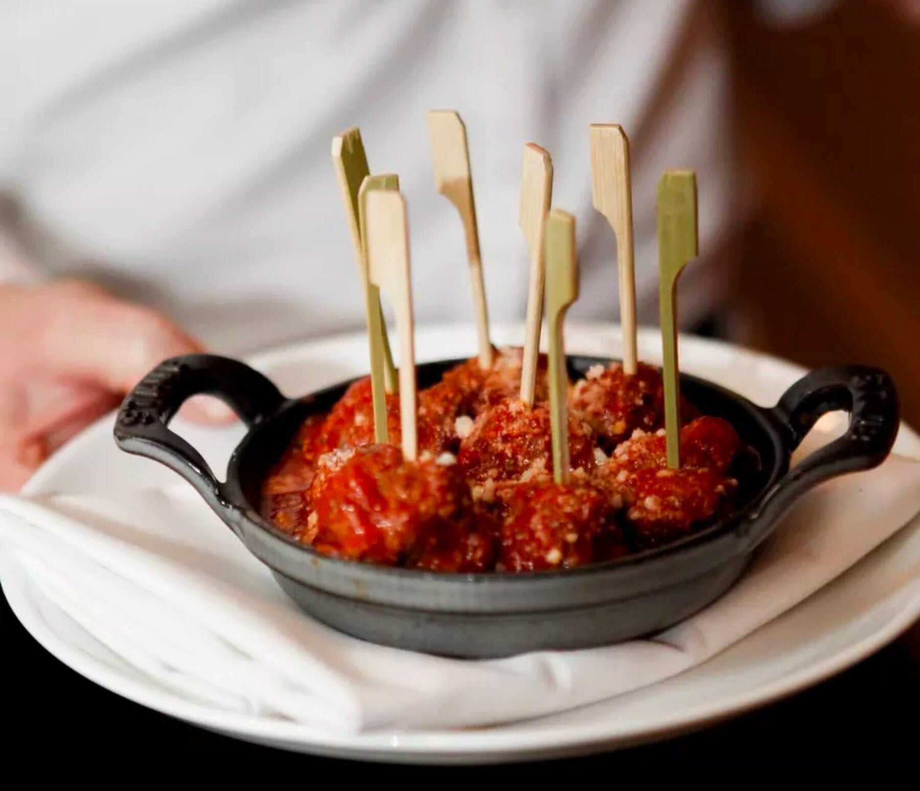 Charcuterie toothpicks used to serve meatball appetizers
