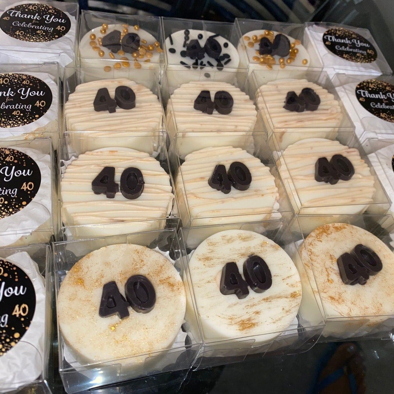 Bakery tray with several cheesecakes packaged in clear single-serve boxes